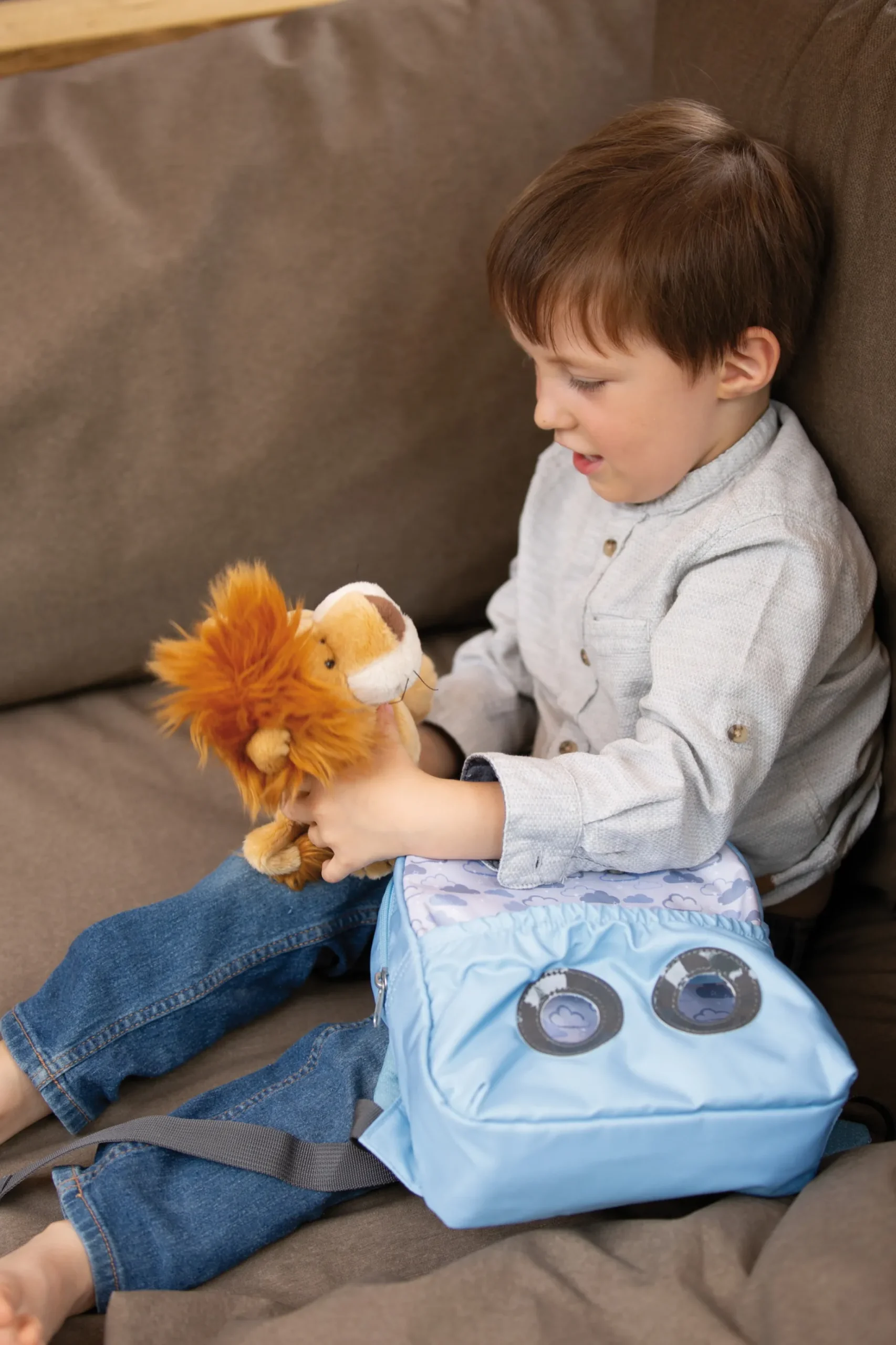 Backpack with soft toy Lion