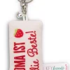 Keyholder mini plush cushion "Oma ist die Beste!" w. bell