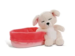Cuddly toy dog in red-pink basket