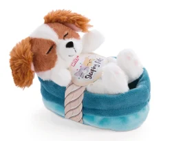Soft toy puppy cocker spaniel sleeping in basket