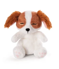 Soft toy puppy cocker spaniel sleeping in basket