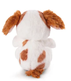 Soft toy puppy cocker spaniel sleeping in basket