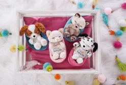 Soft toy puppy cocker spaniel sleeping in basket